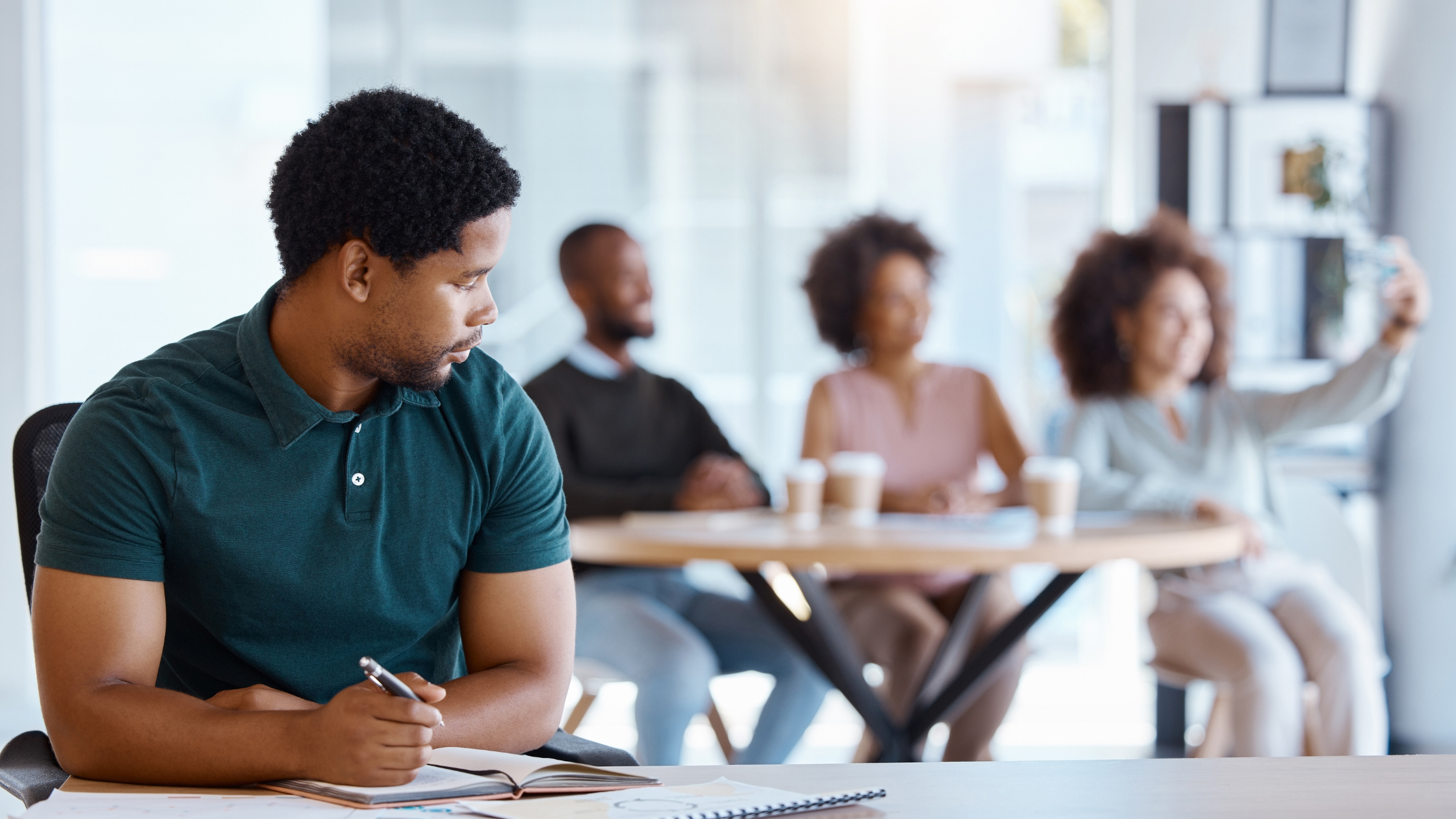 a man with social anxiety sitting alone