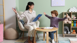 A woman giving a boy a psychological evaluation